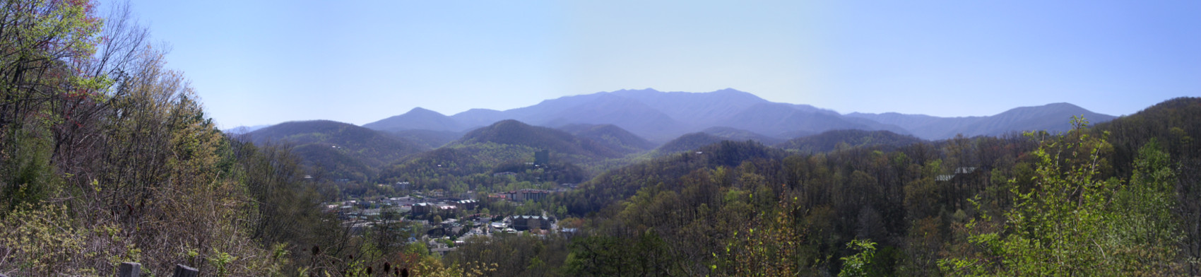 [4 photos stitched together of which 3 are scenery and 1 shows Gatlinburg.]